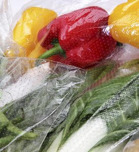 close-up vegetables in cellophane bags
